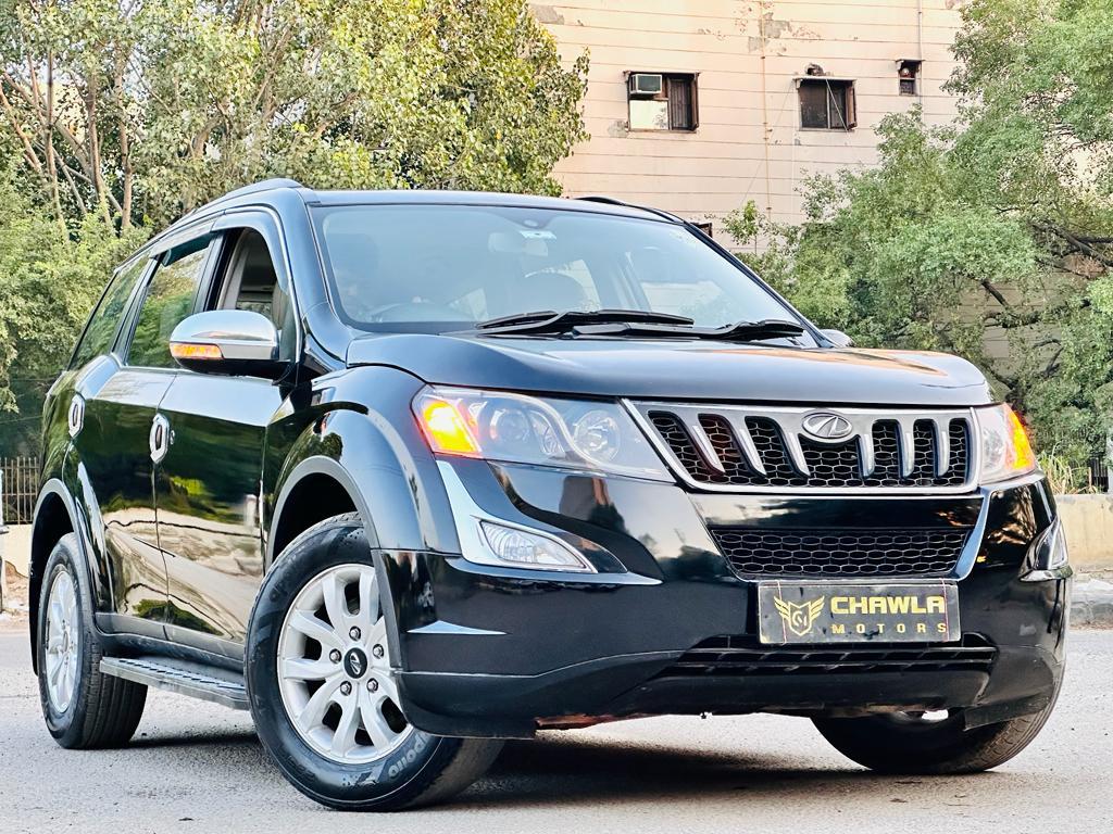 Mahindra XUV W10 with sunroof push automatic model 2016 running 68k DL number