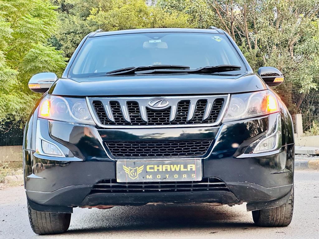 Mahindra XUV W10 with sunroof push automatic model 2016 running 68k DL number