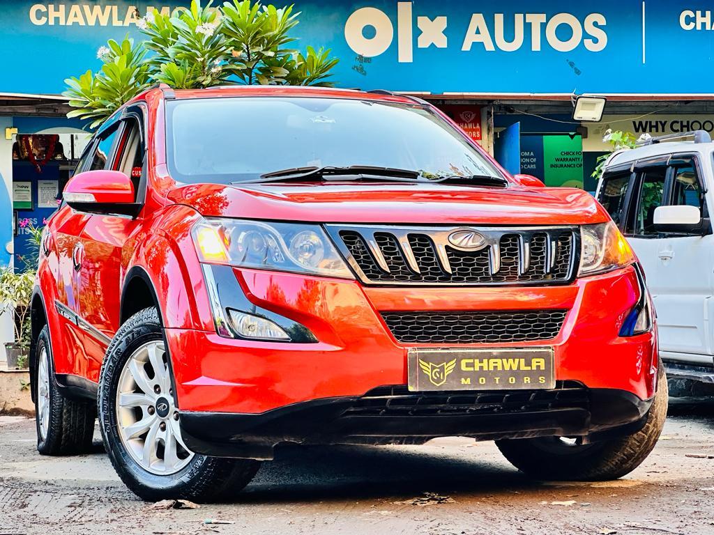 Mahindra XUV W10 with sunroof push model 2015 running 83k DL number