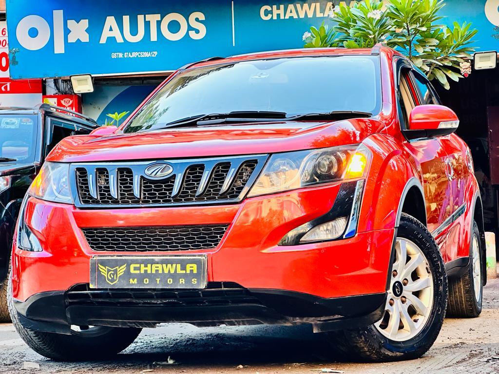 Mahindra XUV W10 with sunroof push model 2015 running 83k DL number