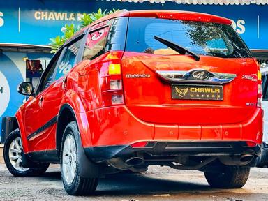 Mahindra XUV W10 with sunroof push model 2015 running 83k DL number