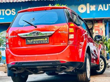 Mahindra XUV W10 with sunroof push model 2015 running 83k DL number