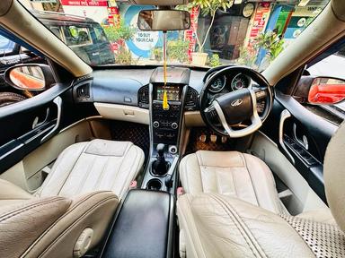 Mahindra XUV W10 with sunroof push model 2015 running 83k DL number