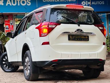 Mahindra XUV W10 with sunroof push model 2018 running 52k HR number