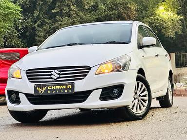 Maruti Ciaz zxi+ petrol model 2015 running 63k DL number