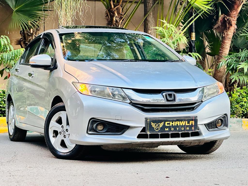 Honda City VX MT with sunroof diesel model 2014 running 84k DL number