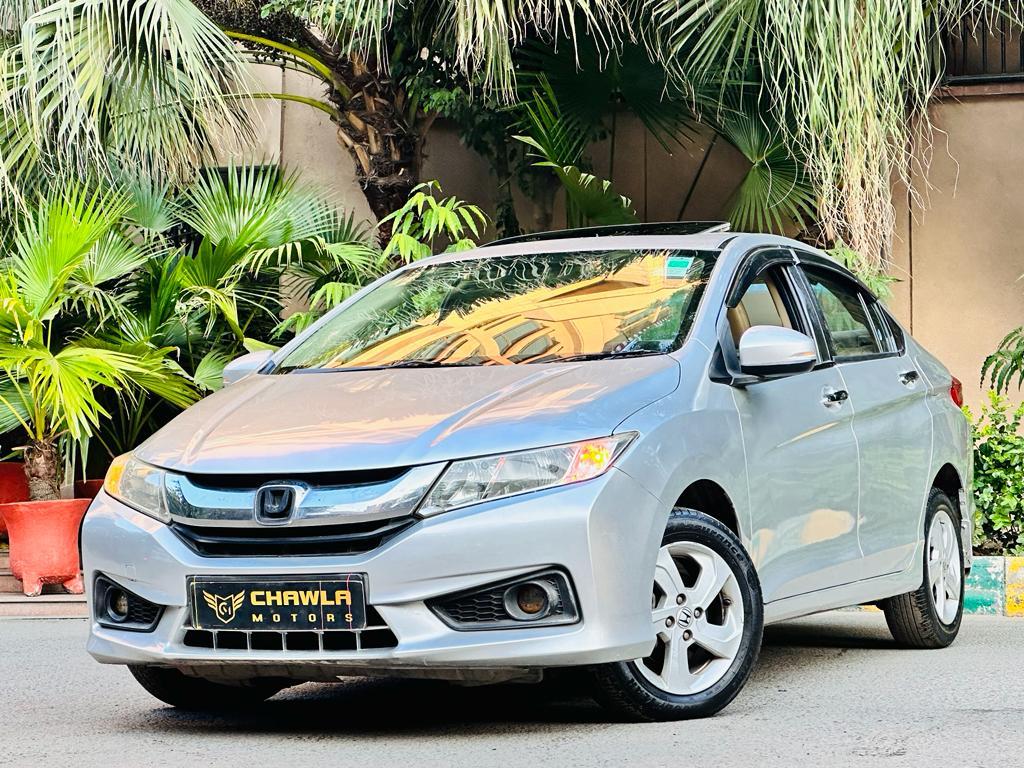 Honda City VX MT with sunroof diesel model 2014 running 84k DL number