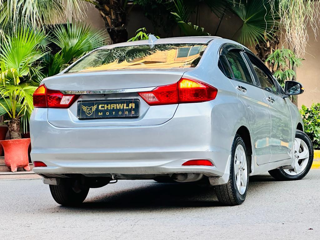 Honda City VX MT with sunroof diesel model 2014 running 84k DL number