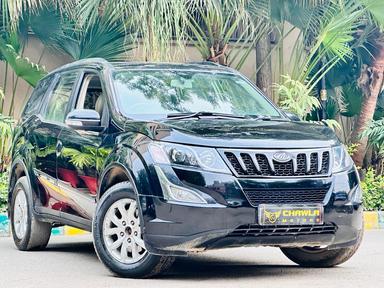 Mahindra XUV W10 with sunroof push model 2015 running 70k HR number