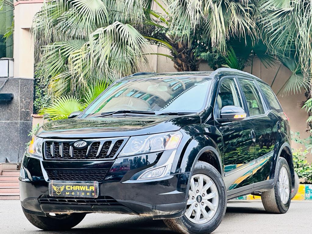 Mahindra XUV W10 with sunroof push model 2015 running 70k HR number