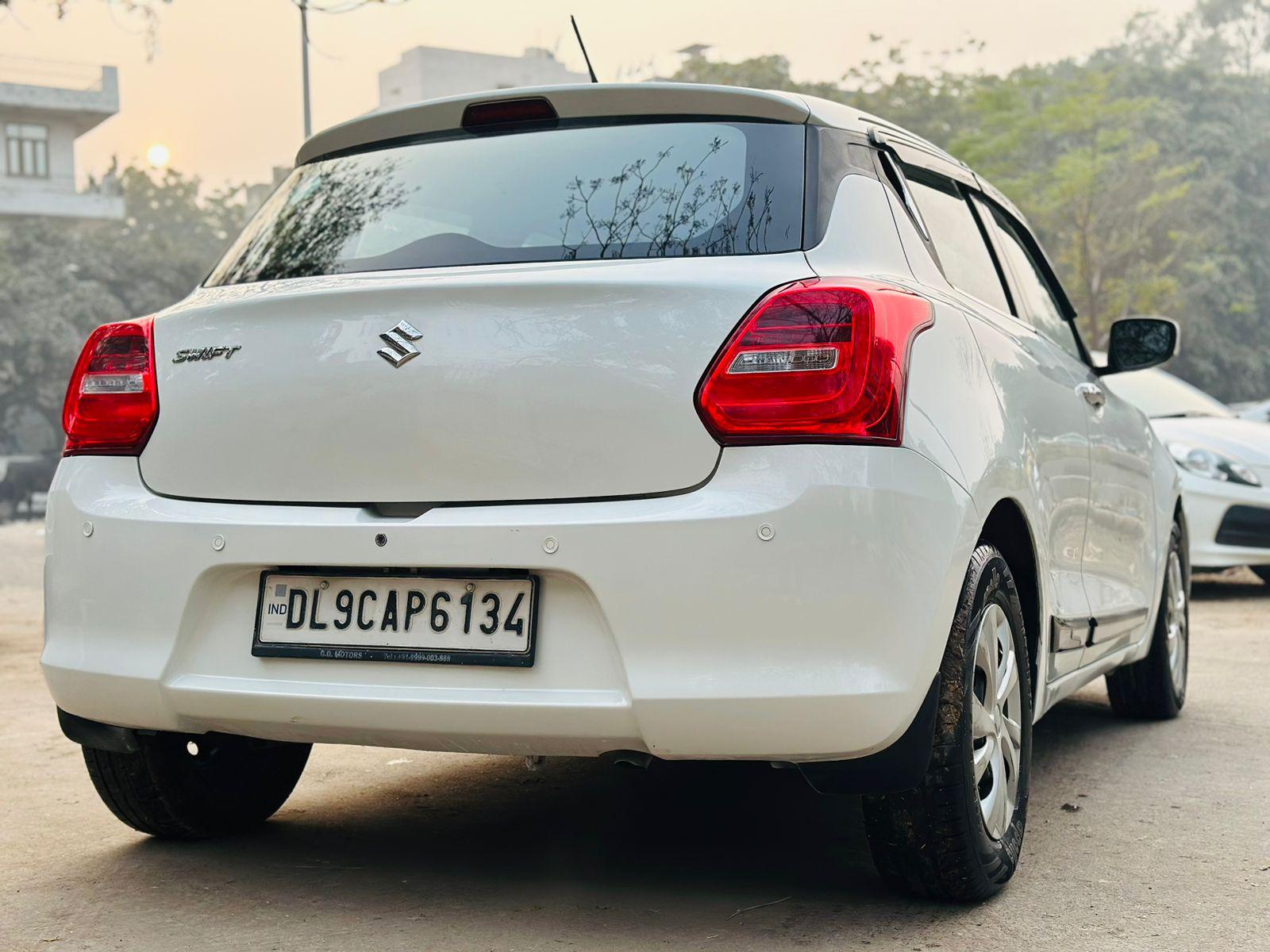 Maruti Swift vxi petrol CNG model 2018 running 73k DL number