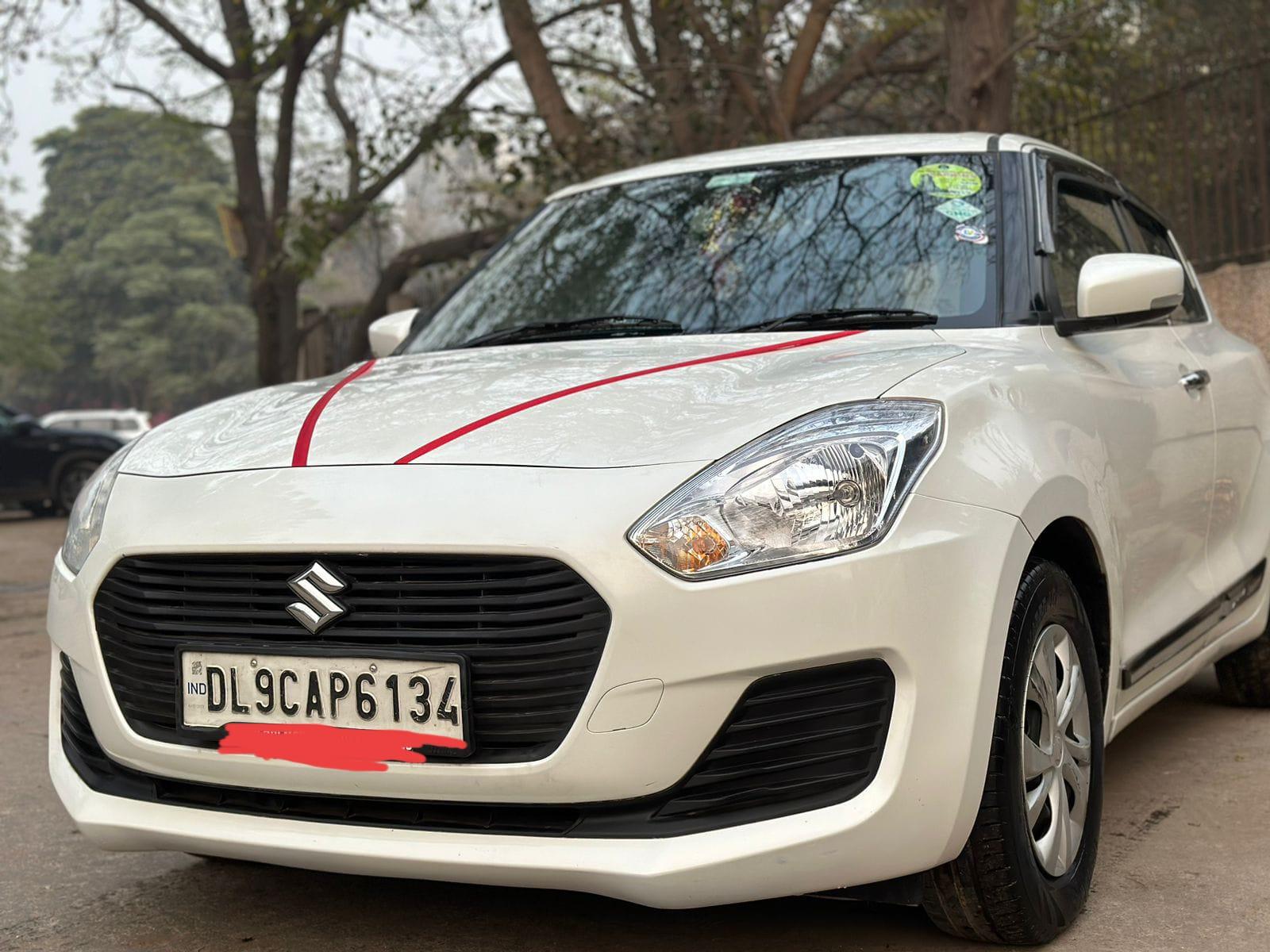 Maruti Swift vxi petrol CNG model 2018 running 73k DL number