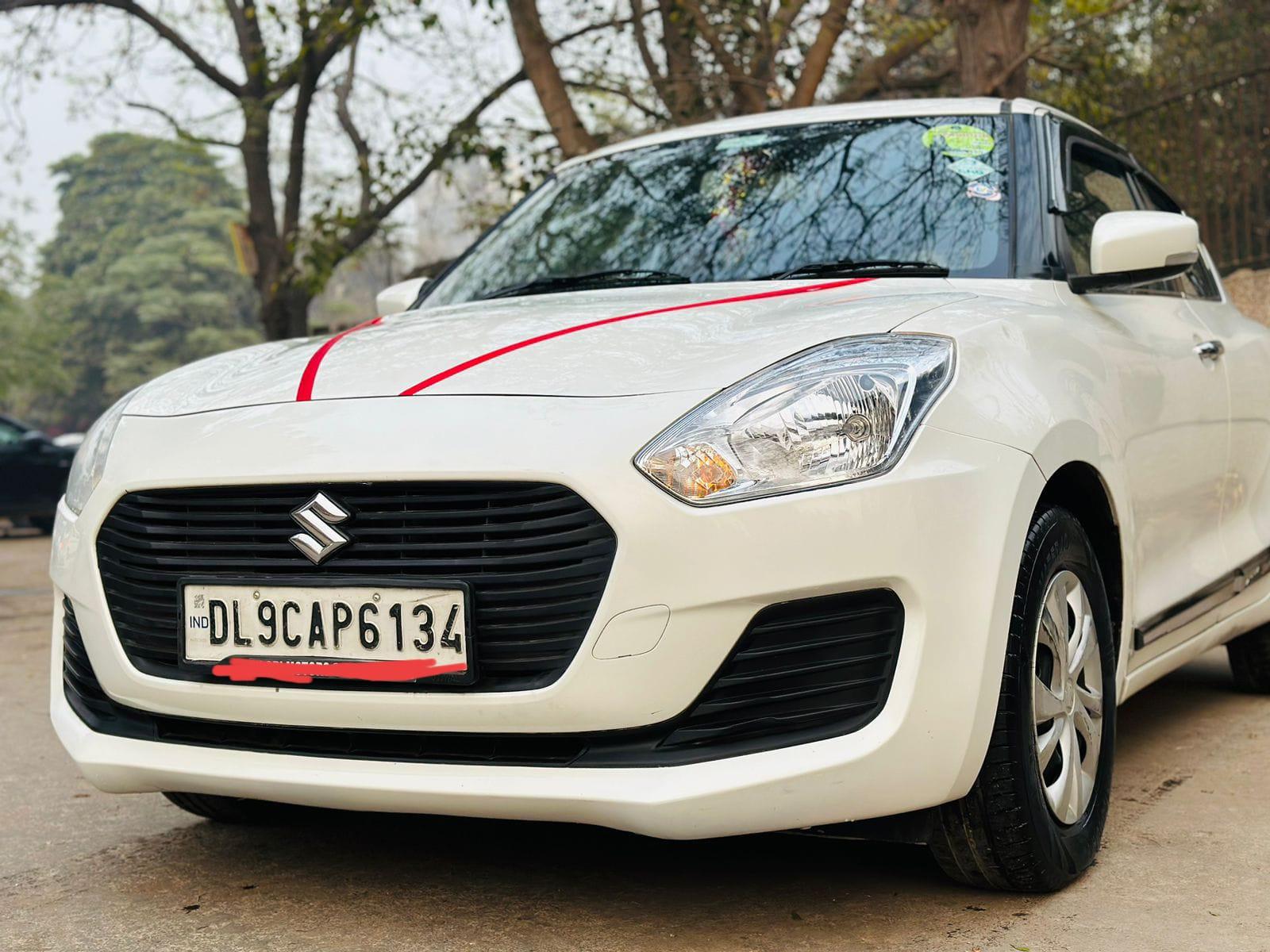 Maruti Swift vxi petrol CNG model 2018 running 73k DL number