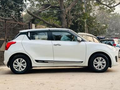 Maruti Swift vxi petrol CNG model 2018 running 73k DL number