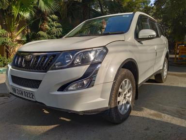 Mahindra XUV W10 with sunroof push model 2016 running 72k HR number