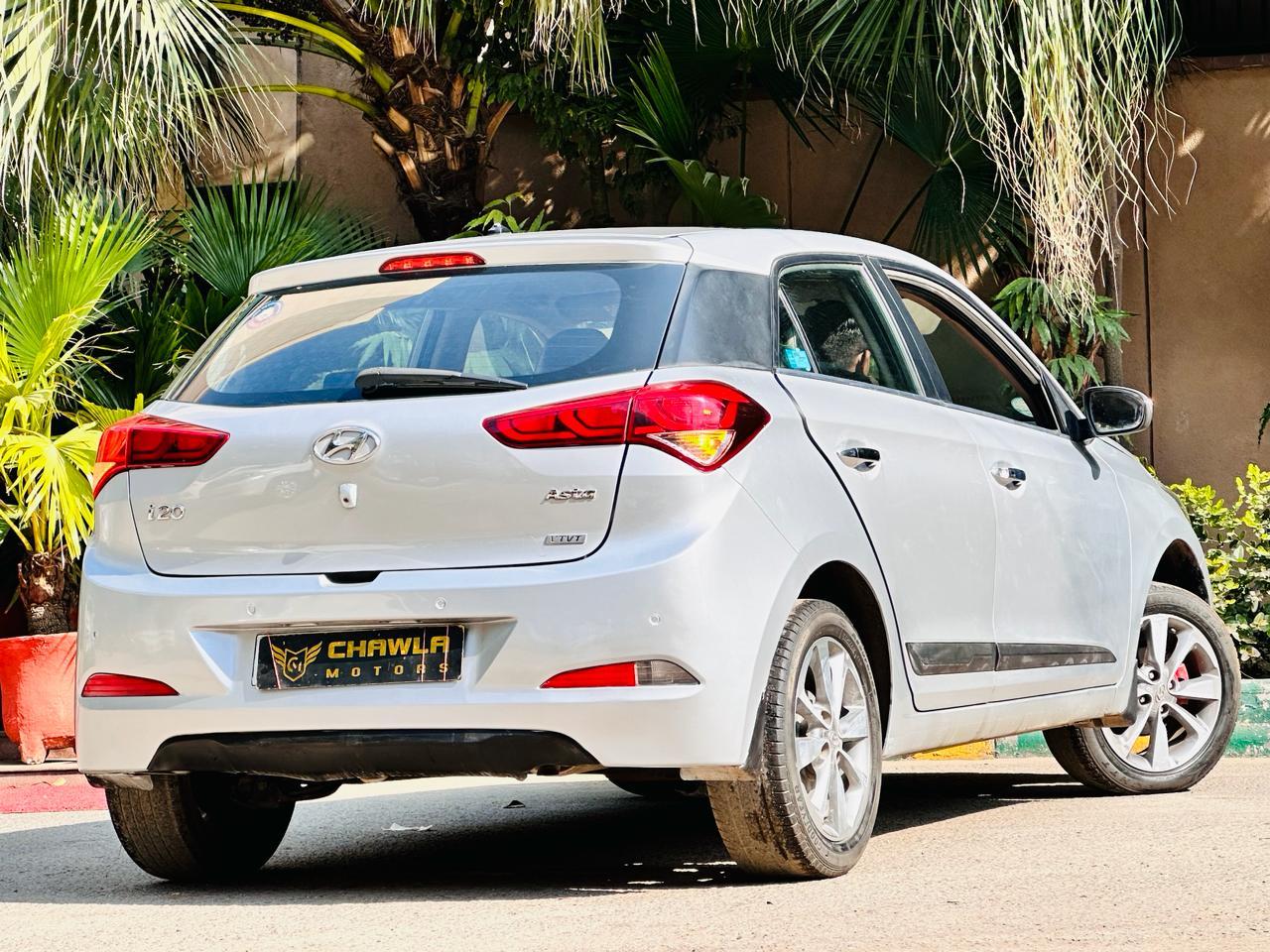 Hyundai i20 Asta petrol model 2015 running 72k DL number