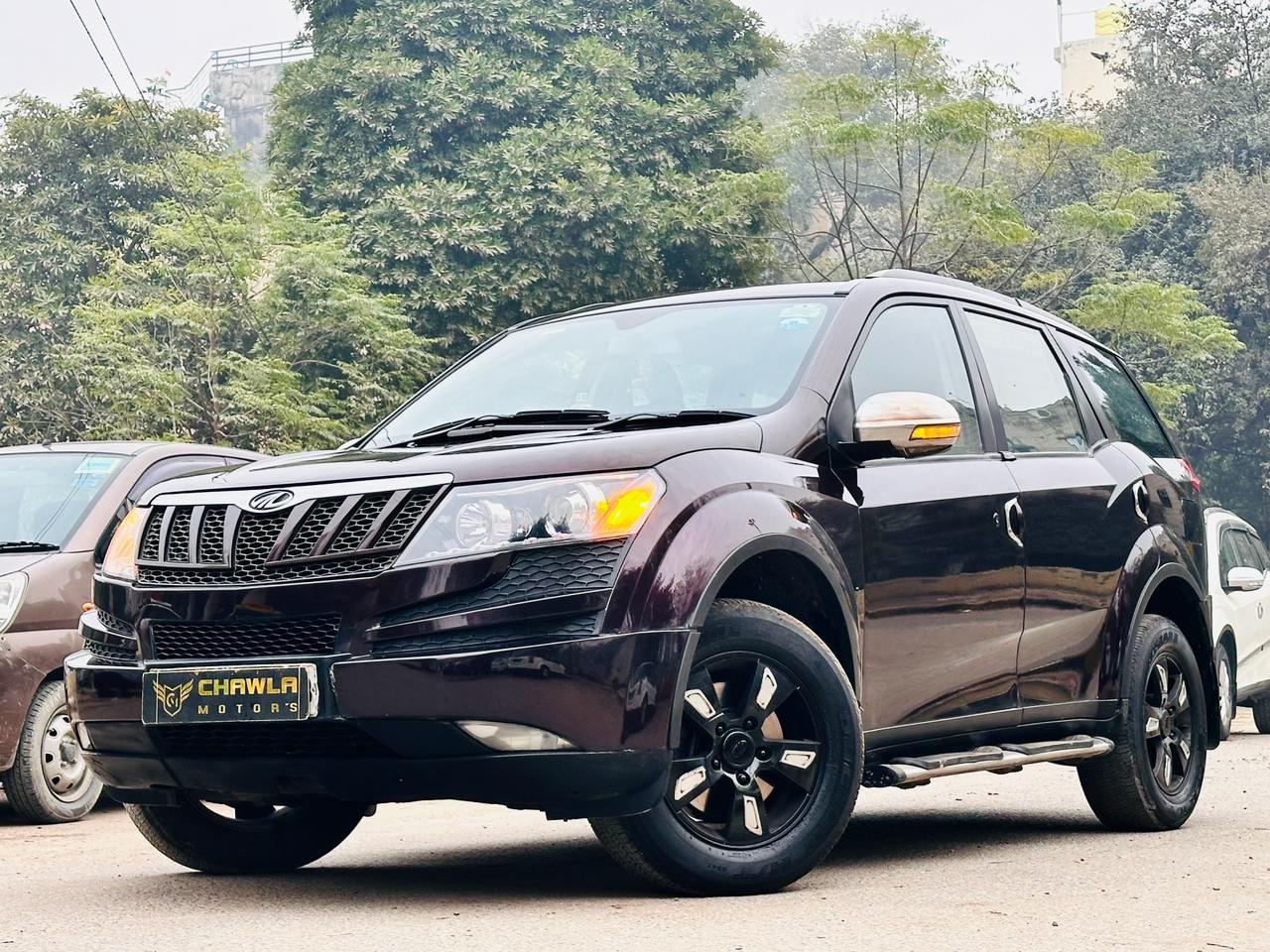 Mahindra XUV w8 model 2014 running 72k HR number