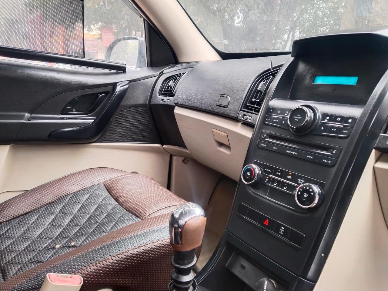 Mahindra XUV model 2015 running 72k DL number