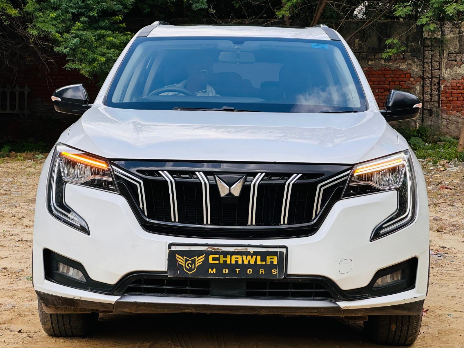 Mahindra XUV 700 Ax5 MT petrol model 2022 running 58k HR number