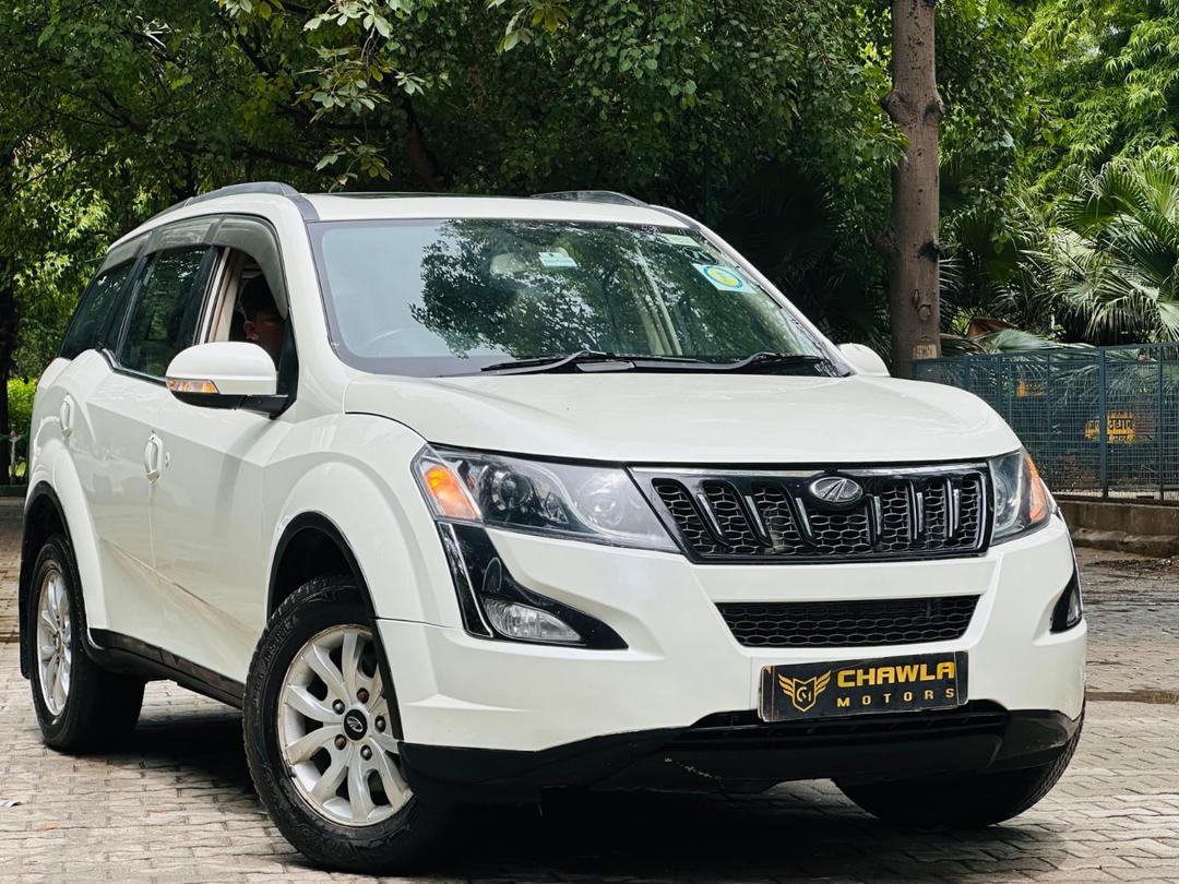 Mahindra XUV W10 with sunroof push model 2015 running 80k DL number