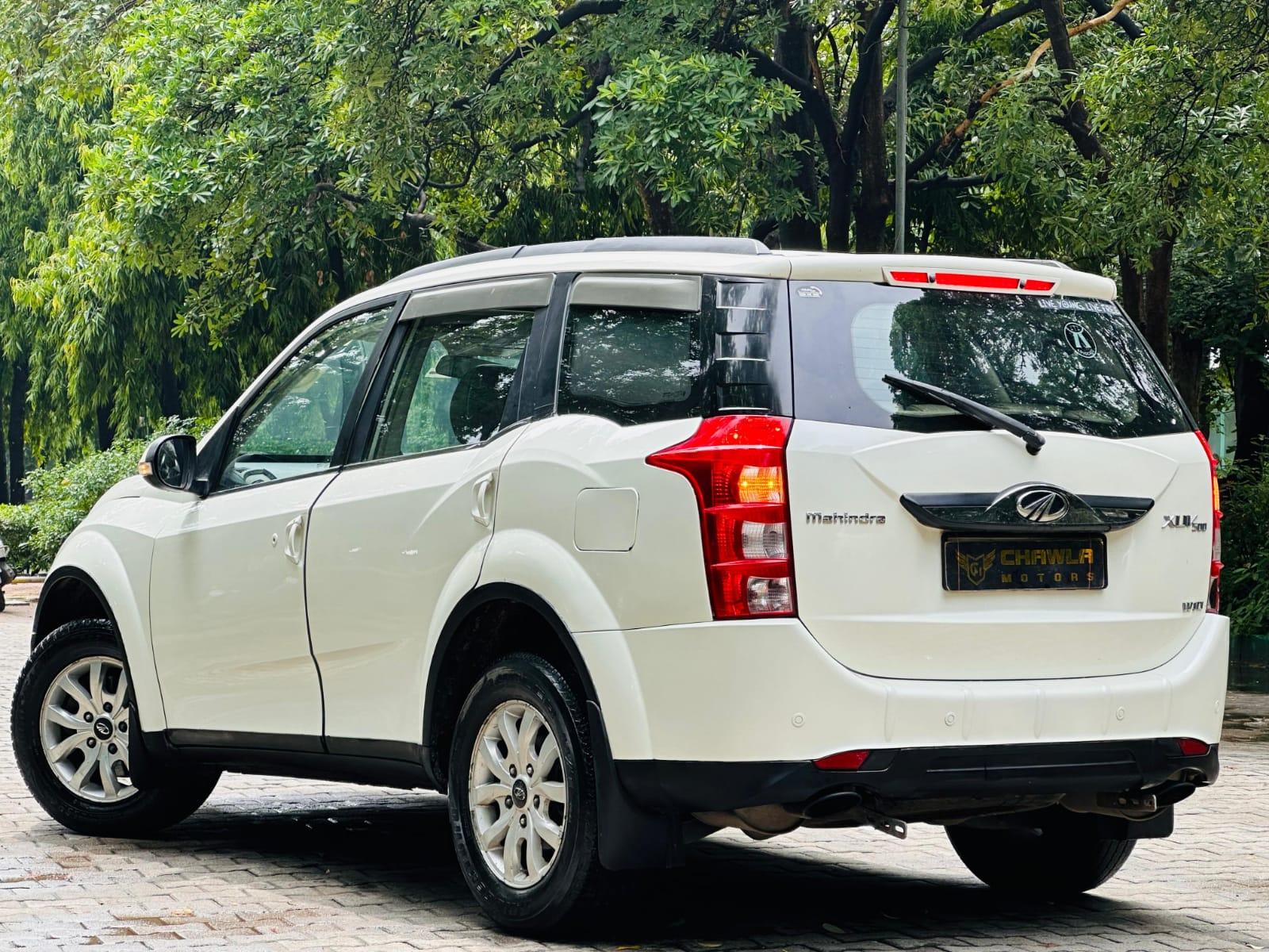 Mahindra XUV W10 with sunroof push model 2015 running 80k DL number