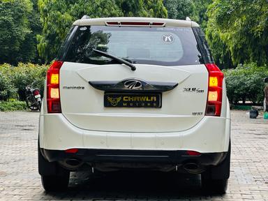 Mahindra XUV W10 with sunroof push model 2015 running 80k DL number