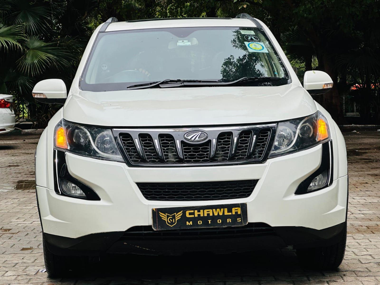 Mahindra XUV W10 with sunroof push model 2015 running 80k DL number