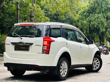 Mahindra XUV W10 with sunroof push model 2015 running 80k DL number