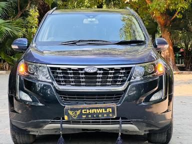 Mahindra XUV W10 with sunroof model 2015 running 66k DL number