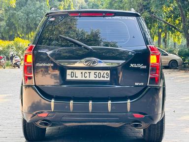 Mahindra XUV W10 with sunroof model 2015 running 66k DL number