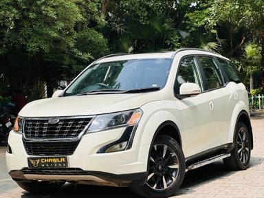 Mahindra XUV W11 with sunroof push model 2019 running 66k HR number