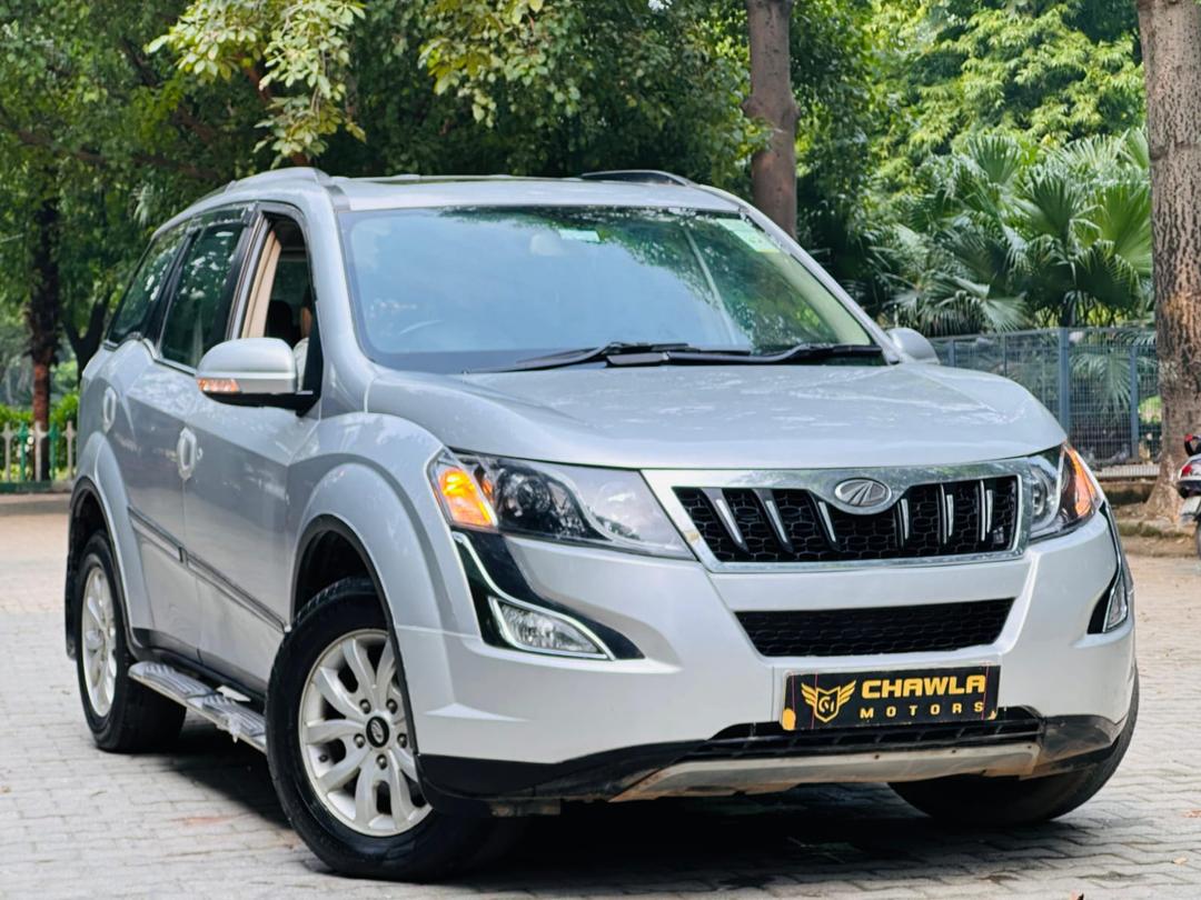 Mahindra XUV W10 with sunroof push model 2015 running 78k HR number