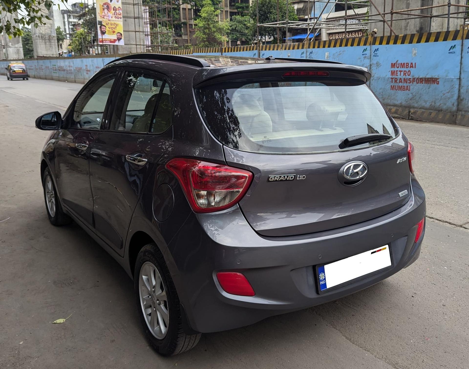 Hyundai Grand I10 Asta (O) Automatic with AMC driven just 38425 kms