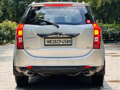 Mahindra XUV W10 with sunroof push model 2015 running 27k DL number