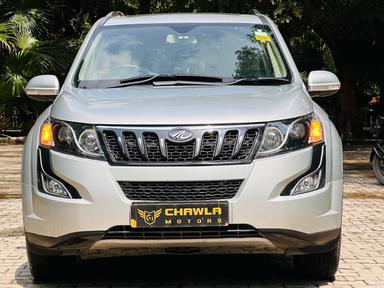 Mahindra XUV W10 with sunroof push model 2015 running 27k DL number